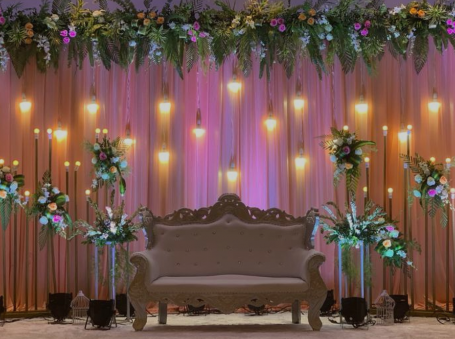 Wedding Reception Decor with flowers and light bulbs