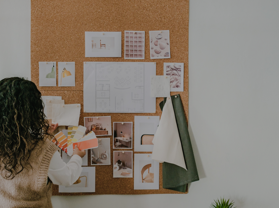 A Woman planning on a pinboard